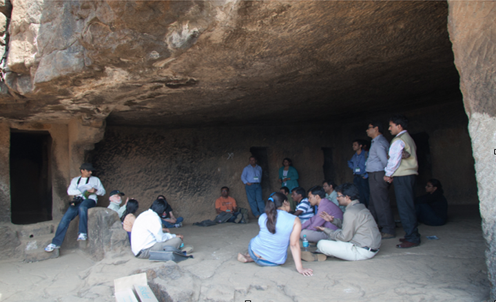One&#x20;of&#x20;the&#x20;small&#x20;group&#x20;mentoring&#x20;sessions&#x20;held&#x20;in&#x20;an&#x20;ancient&#x20;Buddhist&#x20;cave&#x20;with&#x20;Nobel&#x20;Laureate&#x20;Mike&#x20;Bishop&#x20;leading&#x20;the&#x20;discussion&#x20;&#x28;YIM&#x20;2012&#x29;