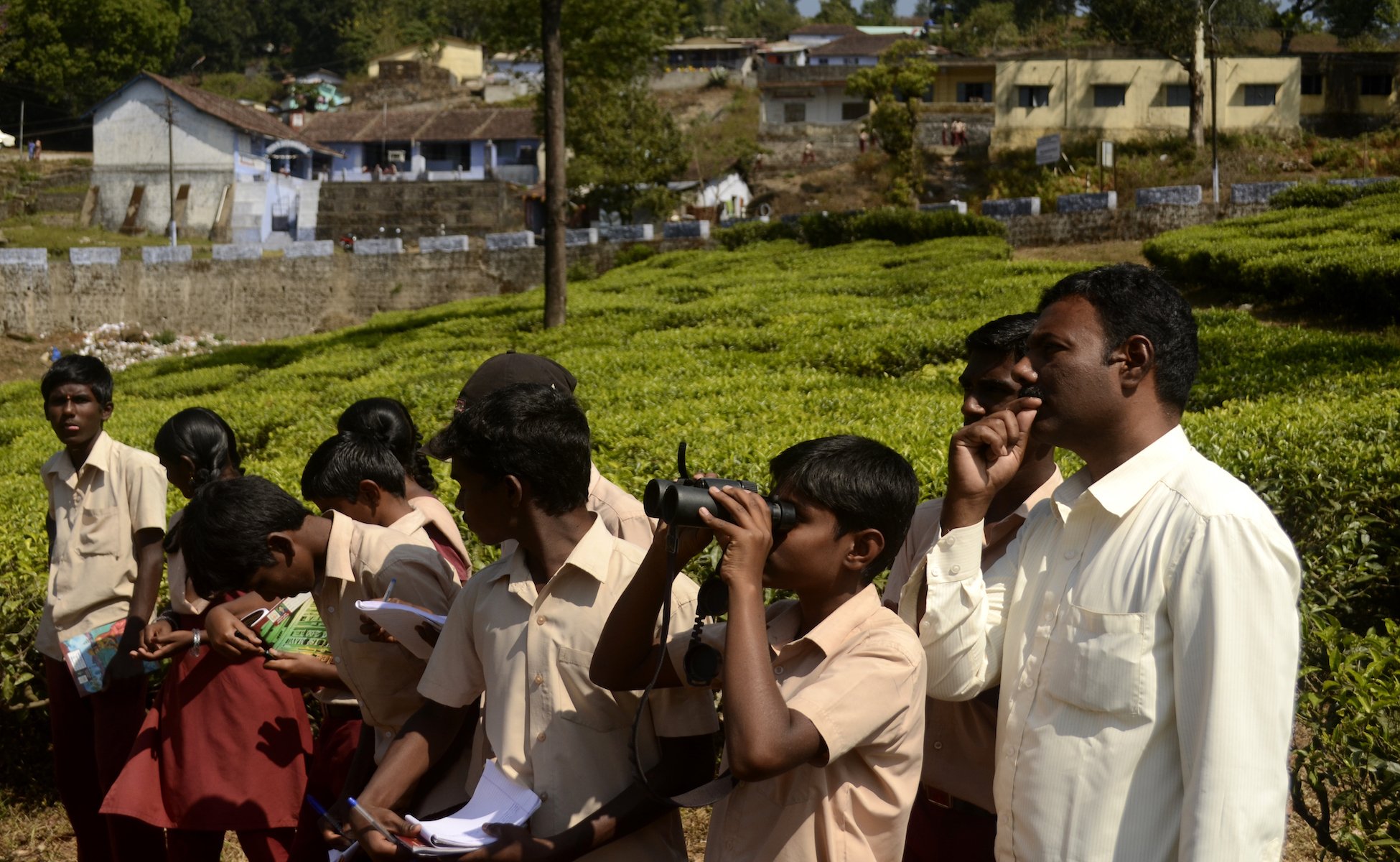 School kids watch birds on Anaimalai hills