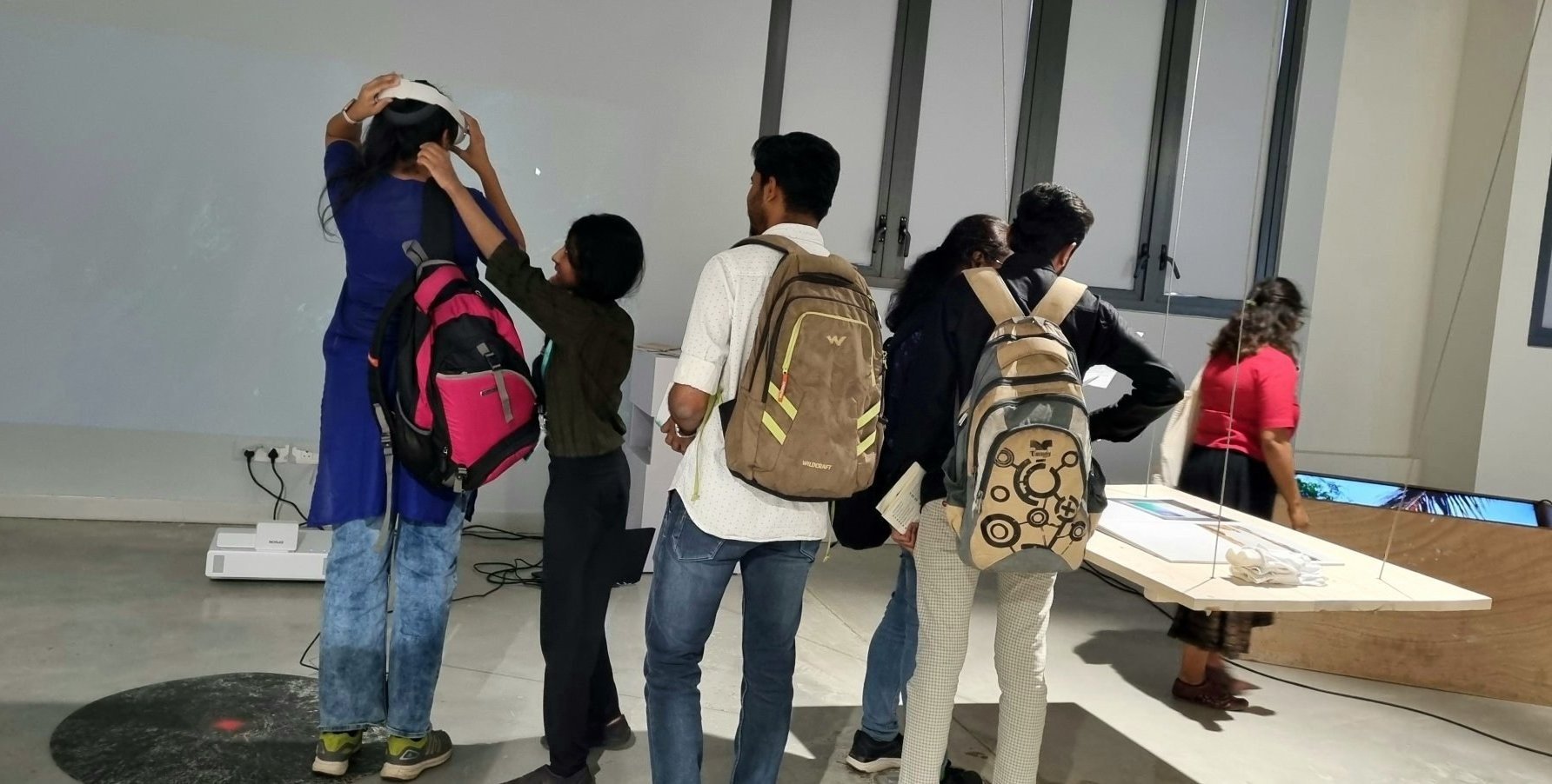 Visitors interacting with the exhibits at the Critical Zones exhibition. Picture Credit: Sindhu M.