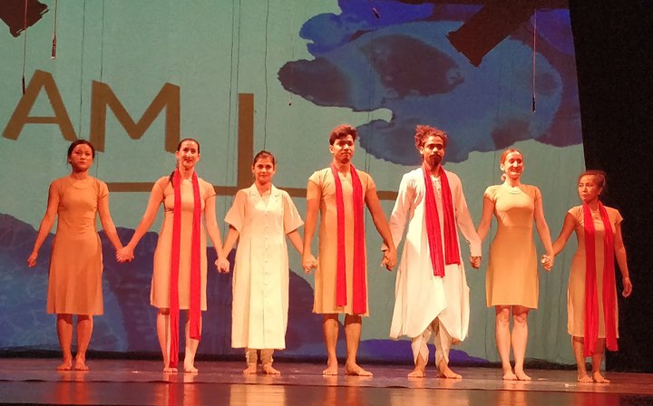 'I am +' performers on stage